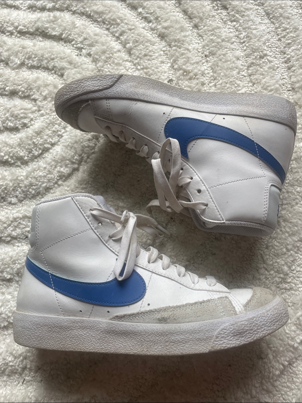 Nike White High-Top Sneakers with Blue Swoosh